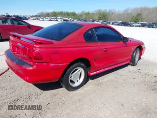 1996 Ford Mustang with VIN 1FALP4044TF203127, listed as a IAAI auction lot 41887713 with 86,008 mi miles. Bid and sale history available at carsss.com. Image 4.