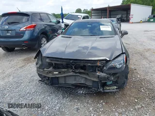 2015 Mercedes-Benz SLK 250 z VIN WDDPK4HA5FF110938, wystawiony jako IAAI lot #42098160 z przebiegiem 46 779 mil mil oraz . Historia ofert i sprzedaży dostępna na DreamBid. Obrazek 6.