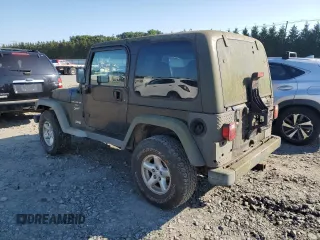 2001 Jeep Wrangler Sport with VIN 1J4FA49SX1P318889, listed as a Copart auction lot 67213064 with 157,444 mi miles and Clean Title. Bid and sale history available at carsss.com. Image 2.