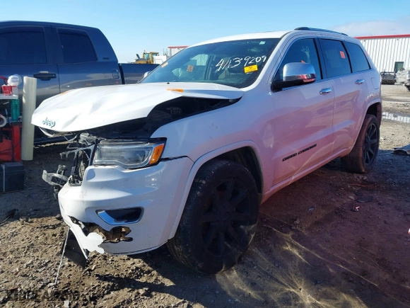 2017 Jeep Grand Cherokee Overland with VIN 1C4RJECG0HC636342, listed as a IAAI auction lot 41139209 with 145,760 mi miles. Bid and sale history available at carsss.com. Image 17.