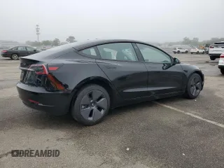 2023 Tesla Model 3 with VIN 5YJ3E1EA9PF687187, listed as a Copart auction lot 61044055 with 7,007 mi miles and Salvage title. Bid and sale history available at DreamBid. Image 3.