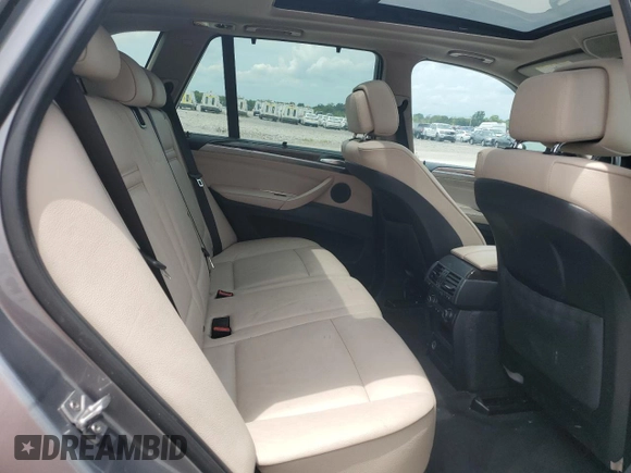 2012 BMW X5 35i with VIN 5UXZV4C59CL991689, listed as a Copart auction lot 64022615 with 208,620 mi miles and Salvage title. Bid and sale history available at DreamBid. Image 11.