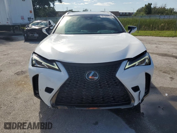 2022 Lexus UX with VIN JTHE3JBHXN2048153, listed as a Copart auction lot 67904334 with 50,346 mi miles and Salvage Title. Bid and sale history available at carsss.com. Image 5.