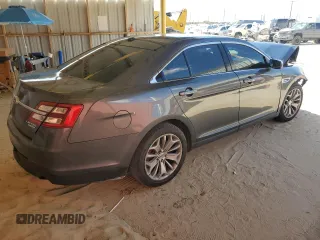 2018 Ford Taurus Limited z VIN 1FAHP2F87JG102207, wystawiony jako Copart lot #55647675 z przebiegiem 122 527 mil mil oraz Szkoda całkowita • Salvage title. Historia ofert i sprzedaży dostępna na DreamBid. Obrazek 3.