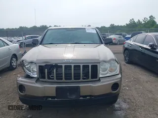 2005 Jeep Grand Cherokee Laredo z VIN 1J4GR48K75C719070, wystawiony jako IAAI lot #42673745 z przebiegiem 181 152 mil mil oraz . Historia ofert i sprzedaży dostępna na DreamBid. Obrazek 12.