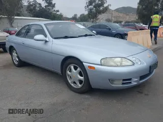 1995 Lexus SC with VIN JT8JZ31C4S0027689, listed as a IAAI auction lot 41877295 with 95,539 mi miles and . Bid and sale history available at DreamBid. Image 1.