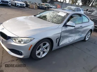 2015 BMW 4 Series 428i with VIN WBA3N7C52FK222743, listed as a IAAI auction lot 41602525 with 81,661 mi miles and . Bid and sale history available at DreamBid. Image 2.