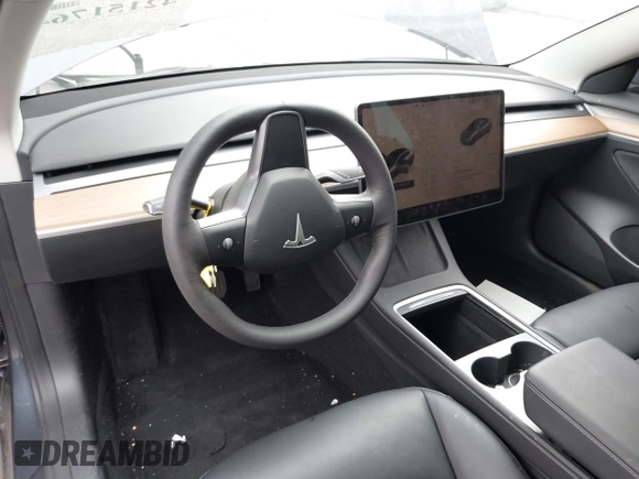 2023 Tesla Model 3 z VIN 5YJ3E1EAXPF403095, wystawiony jako IAAI lot #42151764 z przebiegiem 17 872 mil mil oraz . Historia ofert i sprzedaży dostępna na DreamBid. Obrazek 22.