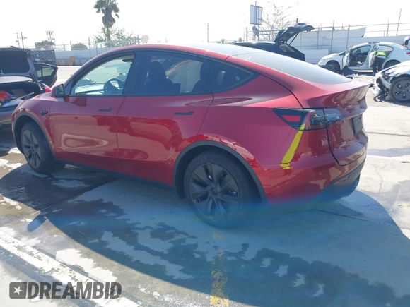 2024 Tesla Model Y Long Range with VIN 7SAYGDEE6RF190947, listed as a IAAI auction lot 41808973 with 2,457 mi miles. Bid and sale history available at carsss.com. Image 3.