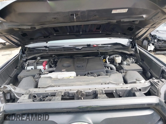 2023 Toyota Tundra with VIN 5TFKB5GDXPX002218, listed as a IAAI auction lot 41932719 with 71,335 mi miles and . Bid and sale history available at DreamBid. Image 10.