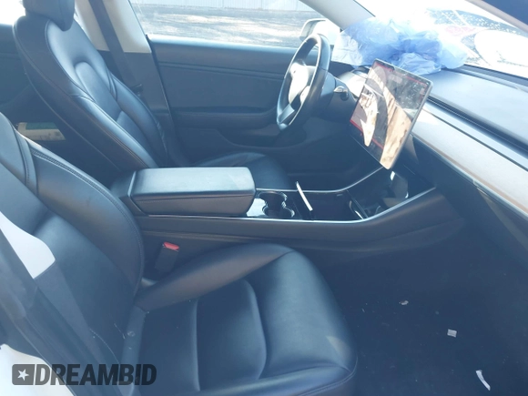 2018 Tesla Model 3 Long Range Battery with VIN 5YJ3E1EA0JF153146, listed as a IAAI auction lot 41621919 with 76,794 mi miles and . Bid and sale history available at DreamBid. Image 5.
