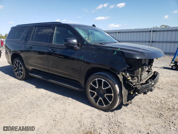 2023 Chevrolet Suburban RST with VIN 1GNSKEKL7PR237198, listed as a Copart auction lot 75116764 with 71,908 mi miles and Salvage Title. Bid and sale history available at carsss.com. Image 4.