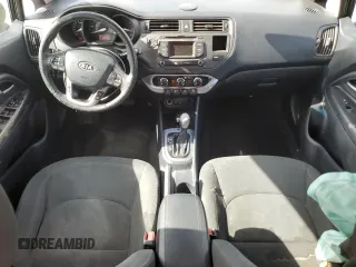 2013 Kia Rio EX with VIN KNADN4A30D6104166, listed as a Copart auction lot 56752345 with 129,708 mi miles and Salvage title. Bid and sale history available at DreamBid. Image 8.