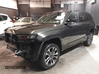 2023 Jeep Grand Cherokee Overland with VIN 1C4RJHDG0P8701157, listed as a IAAI auction lot 42080201 with 24,709 mi miles and . Bid and sale history available at DreamBid. Image 21.