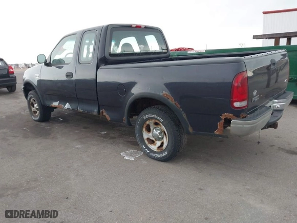 1999 Ford F-150 Work Series with VIN 1FTRX18W2XNA90069, listed as a IAAI auction lot 41496543 with 115,787 mi miles. Bid and sale history available at carsss.com. Image 3.