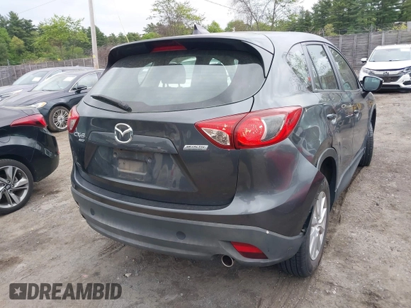 2016 Mazda CX-5 Sport with VIN JM3KE4BY9G0710004, listed as a IAAI auction lot 42323434 with 83,320 mi miles and . Bid and sale history available at DreamBid. Image 16.