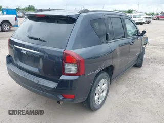 2014 Jeep Compass Sport with VIN 1C4NJCBA7ED882522, listed as a IAAI auction lot 42122474 with 187,157 mi miles and . Bid and sale history available at DreamBid. Image 4.
