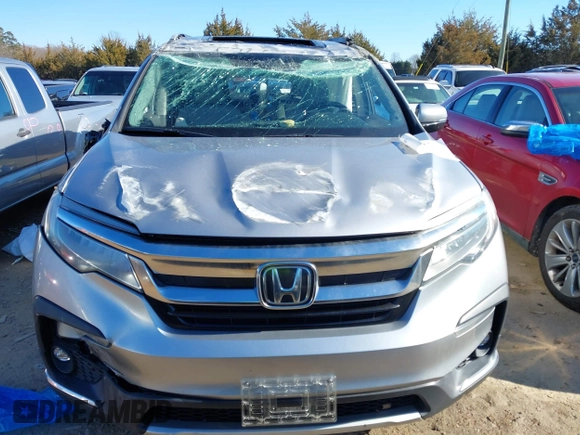 2019 Honda Pilot Touring 7-Passenger with VIN 5FNYF6H60KB038846, listed as a IAAI auction lot 41339385 with Not provided miles and . Bid and sale history available at DreamBid. Image 12.