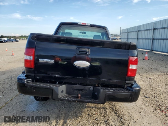 2007 Ford F-150 STX with VIN 1FTRF02297KD15057, listed as a Copart auction lot 73847974 with 184,413 mi miles and Salvage Title. Bid and sale history available at carsss.com. Image 6.