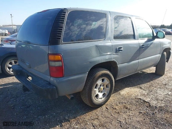 2002 GMC Yukon SLT with VIN 1GKEK13Z12J152306, listed as a IAAI auction lot 41689896 with 194525 miles. Bid and sale history available at carsss.com. Image 4.