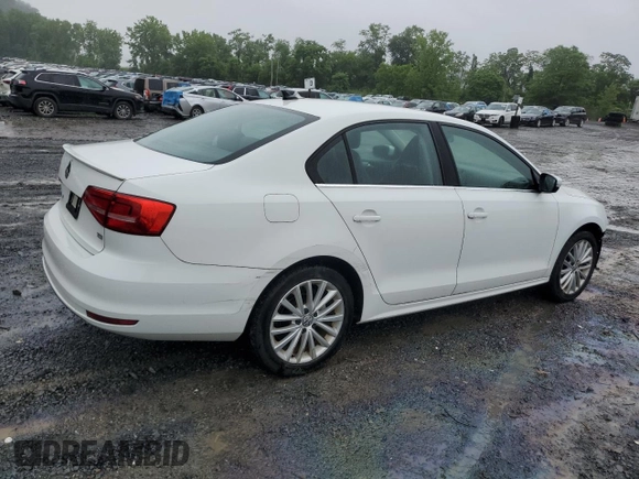 2015 Volkswagen Jetta SE with VIN 3VWD17AJ9FM233571, listed as a Copart auction lot 61436735 with 58,690 mi miles and Salvage title. Bid and sale history available at DreamBid. Image 3.