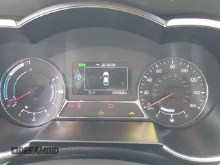2015 Kia Optima Hybrid with VIN KNAGM4AD8F5088834, listed as a IAAI auction lot 42078516 with 150,069 mi miles. Bid and sale history available at carsss.com. Image 7.