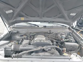 2000 Toyota Tundra SR5 with VIN 5TBRT3414YS086059, listed as a IAAI auction lot 41609962 with 105,030 mi miles and . Bid and sale history available at DreamBid. Image 10.