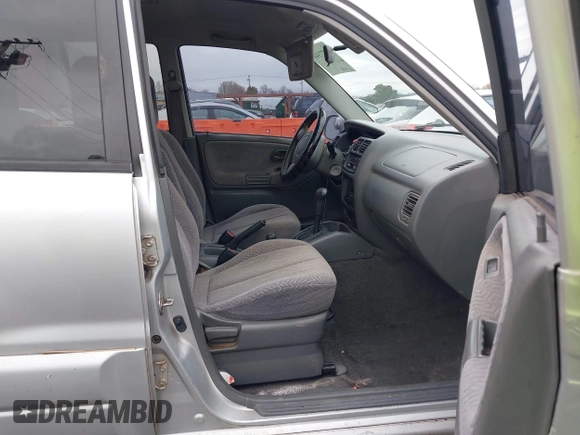 2002 Suzuki Grand Vitara JLX z VIN JS3TD62V324161291, wystawiony jako IAAI lot #41577344 z przebiegiem 164 658 mil mil oraz . Historia ofert i sprzedaży dostępna na DreamBid. Obrazek 5.