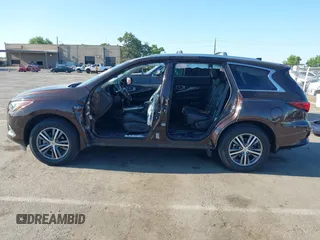 2019 Infiniti QX60 Pure with VIN 5N1DL0MM4KC569307, listed as a IAAI auction lot 42300605 with 40,336 mi miles and . Bid and sale history available at DreamBid. Image 15.