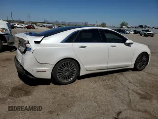 2013 Lincoln MKZ z VIN 3LN6L2GKXDR814615, wystawiony jako Copart lot #65654335 z przebiegiem 100 510 mil mil oraz Szkoda całkowita • Salvage title. Historia ofert i sprzedaży dostępna na DreamBid. Obrazek 3.