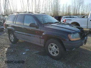 1999 Jeep Grand Cherokee Laredo z VIN 1J4GW58N1XC737706, wystawiony jako Copart lot #83107914 z przebiegiem Nie podano mil oraz Szkoda całkowita • Salvage title. Historia ofert i sprzedaży dostępna na DreamBid. Obrazek 4.
