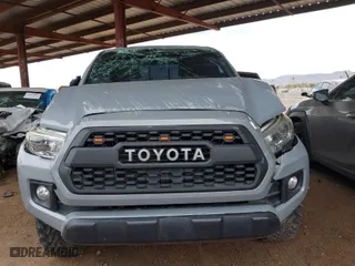 2019 Toyota Tacoma 4WD SR with VIN 3TMCZ5ANXKM225066, listed as a IAAI auction lot 41825265 with 75,908 mi miles. Bid and sale history available at carsss.com. Image 12.