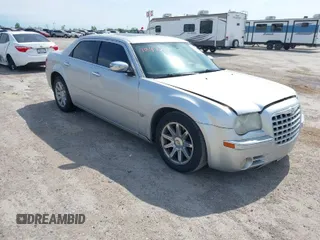 2005 Chrysler 300 with VIN 2C3JA63H05H693522, listed as a IAAI auction lot 41847279 with 162,037 mi miles. Bid and sale history available at carsss.com. Image 1.