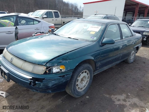 1995 Mercury Sable GS with VIN 1MELM50U8SA632936, listed as a IAAI auction lot 41695182 with 124,194 mi miles. Bid and sale history available at carsss.com. Image 2.