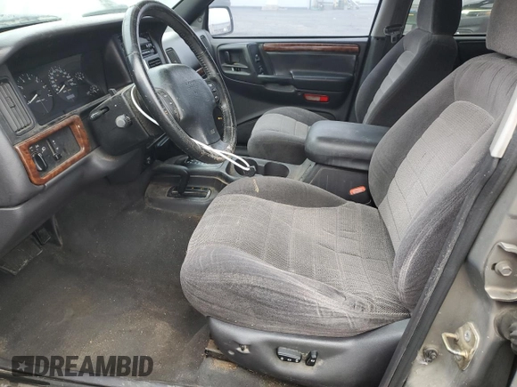 1997 Jeep Grand Cherokee Laredo with VIN 1J4GZ58Y5VC637350, listed as a Copart auction lot 77405444 with 182,482 mi miles and Clean Title. Bid and sale history available at carsss.com. Image 7.