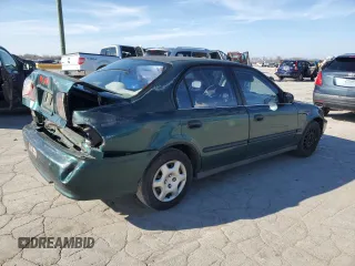 1999 Honda Civic LX with VIN 2HGEJ6676XH573762, listed as a Copart auction lot 44687825 with 272,852 mi miles and Salvage Title. Bid and sale history available at DreamBid. Image 3.