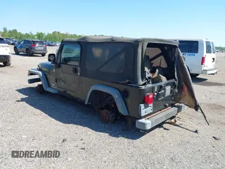 2005 Jeep Wrangler Unlimited with VIN 1J4FA44S25P385421, listed as a IAAI auction lot 42039381 with 1 mi miles. Bid and sale history available at carsss.com. Image 3.