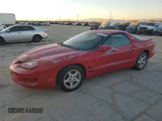 1998 Pontiac Firebird Firebird z VIN 2G2FS22K0W2201603, wystawiony jako Copart lot #79671704 z przebiegiem 309 203 mil mil oraz Czysty tytuł • Clean title. Historia ofert i sprzedaży dostępna na DreamBid. Obrazek 1.