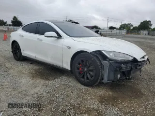 2014 Tesla Model S 60 с VIN 5YJSA1H19EFP52457, выставлен на аукционе Copart как лот 59589905 с пробегом 167 662 миль миль и Списание • Salvage title. История ставок и продаж доступна на DreamBid. Изображение 4.