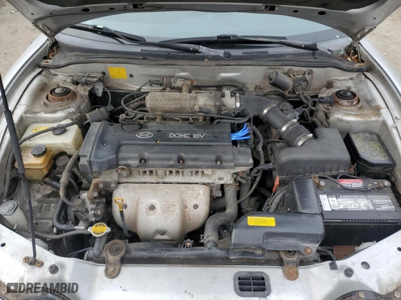 2001 Hyundai Tiburon with VIN KMHJG35F31U224416, listed as a Copart auction lot 83243684 with 59,473 mi miles and Salvage Title. Bid and sale history available at carsss.com. Image 11.