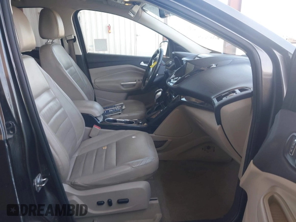 2015 Ford Escape Titanium with VIN 1FMCU0J92FUA20469, listed as a IAAI auction lot 42510293 with 161,466 mi miles and . Bid and sale history available at DreamBid. Image 5.