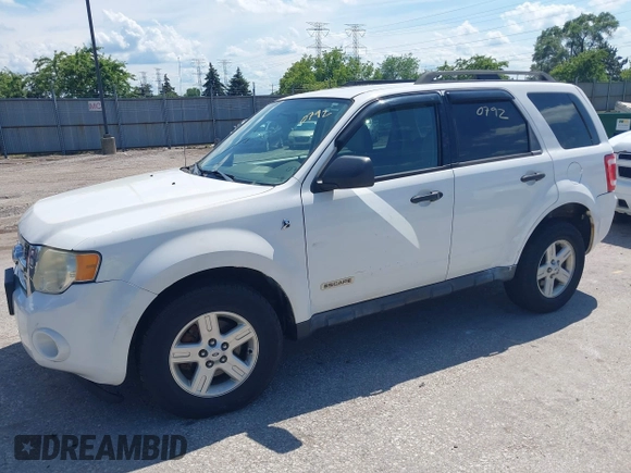 2008 Ford Escape Hybrid with VIN 1FMCU59H98KB58534, listed as a IAAI auction lot 42630792 with 126,993 mi miles and . Bid and sale history available at DreamBid. Image 2.