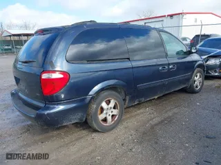 2007 Dodge Grand Caravan SXT with VIN 2D4GP44L37R356984, listed as a IAAI auction lot 41475361 with 153,843 mi miles. Bid and sale history available at carsss.com. Image 4.
