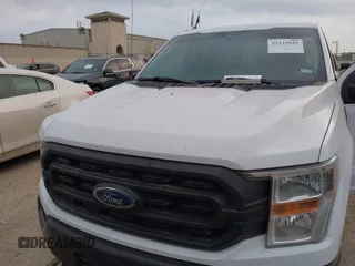 2022 Ford F-150 XL with VIN 1FTFW1E51NKE67183, listed as a IAAI auction lot 42123925 with 100,877 mi miles. Bid and sale history available at carsss.com. Image 6.
