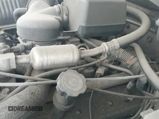 1996 Chevrolet Suburban z VIN 3GNEC16R3TG101906, wystawiony jako IAAI lot #42058102 z przebiegiem 252 488 mil mil oraz . Historia ofert i sprzedaży dostępna na DreamBid. Obrazek 12.