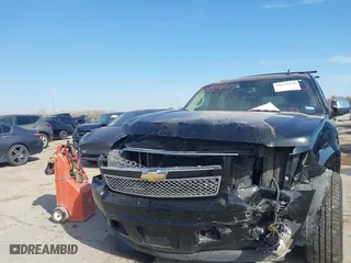 2011 Chevrolet Suburban LTZ with VIN 1GNSCKE03BR117338, listed as a IAAI auction lot 41878479 with 182,327 mi miles. Bid and sale history available at carsss.com. Image 6.