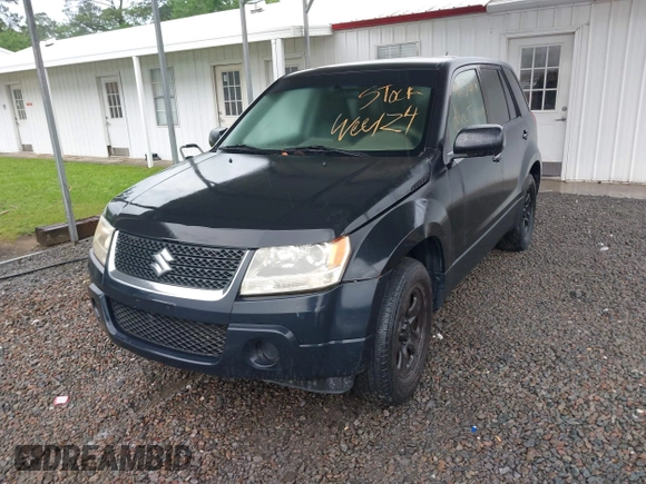 2010 Suzuki Grand Vitara Premium z VIN JS3TE0D25A4100407, wystawiony jako IAAI lot #42249747 z przebiegiem 138 781 mil mil oraz . Historia ofert i sprzedaży dostępna na DreamBid. Obrazek 2.