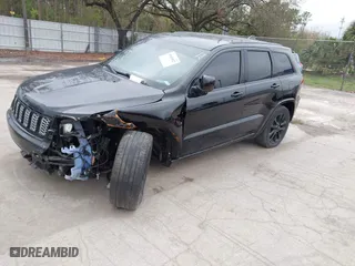 2018 Jeep Grand Cherokee Laredo E with VIN 1C4RJFAG7JC312948, listed as a IAAI auction lot 41624027 with 116,763 mi miles. Bid and sale history available at carsss.com. Image 18.