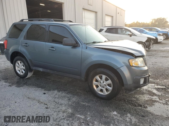 2011 Mazda Tribute Touring with VIN 4F2CY0C79BKM02153, listed as a Copart auction lot 78006704 with 172,884 mi miles and Non Repairable. Bid and sale history available at carsss.com. Image 4.