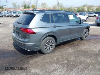 2019 Volkswagen Tiguan SE with VIN 3VV2B7AX5KM198454, listed as a IAAI auction lot 42033410 with 64,381 mi miles and . Bid and sale history available at DreamBid. Image 4.